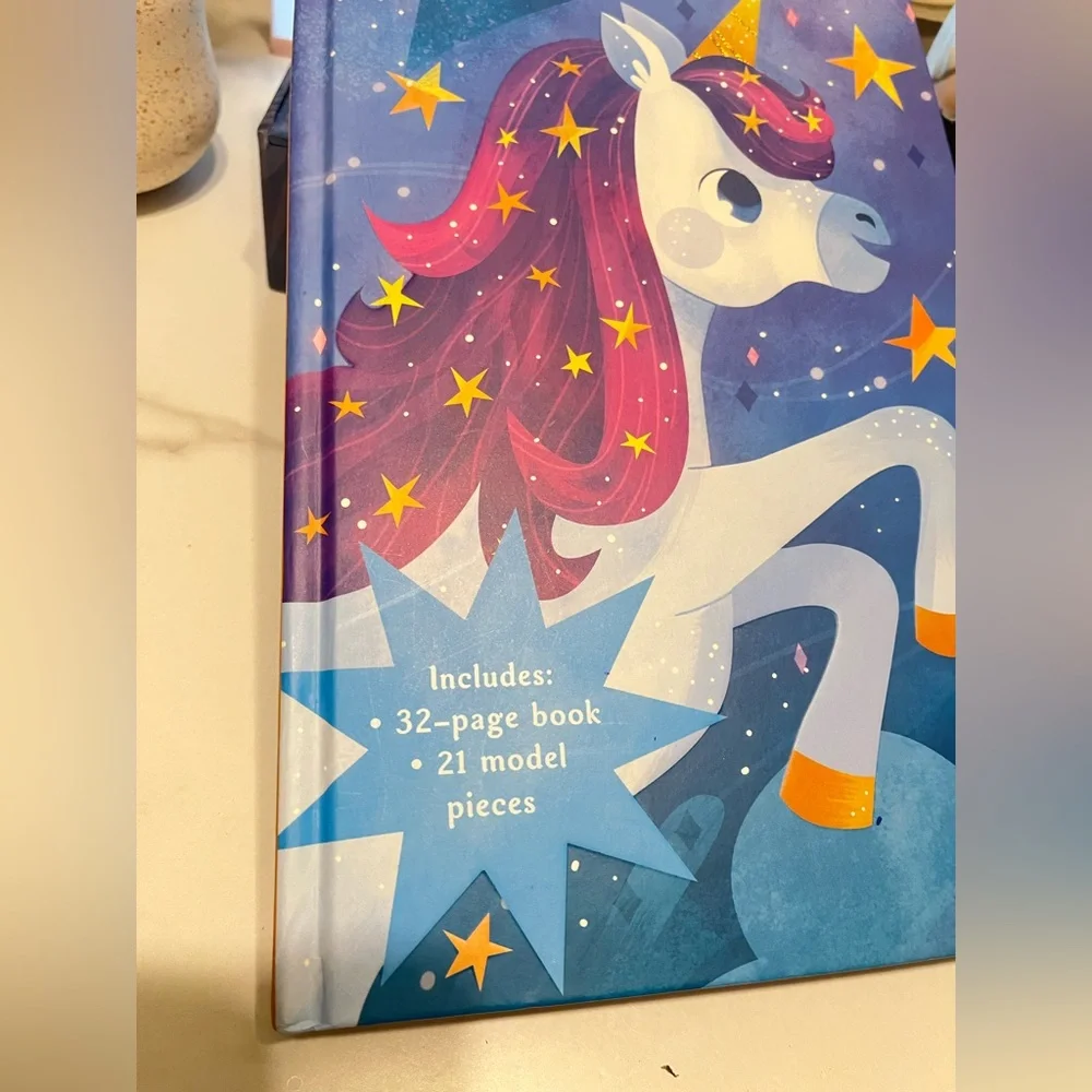 Build the Unicorn Kids Building Set, reading book, and Lear